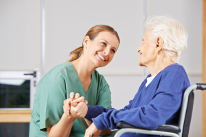 senior woman and a caregiver